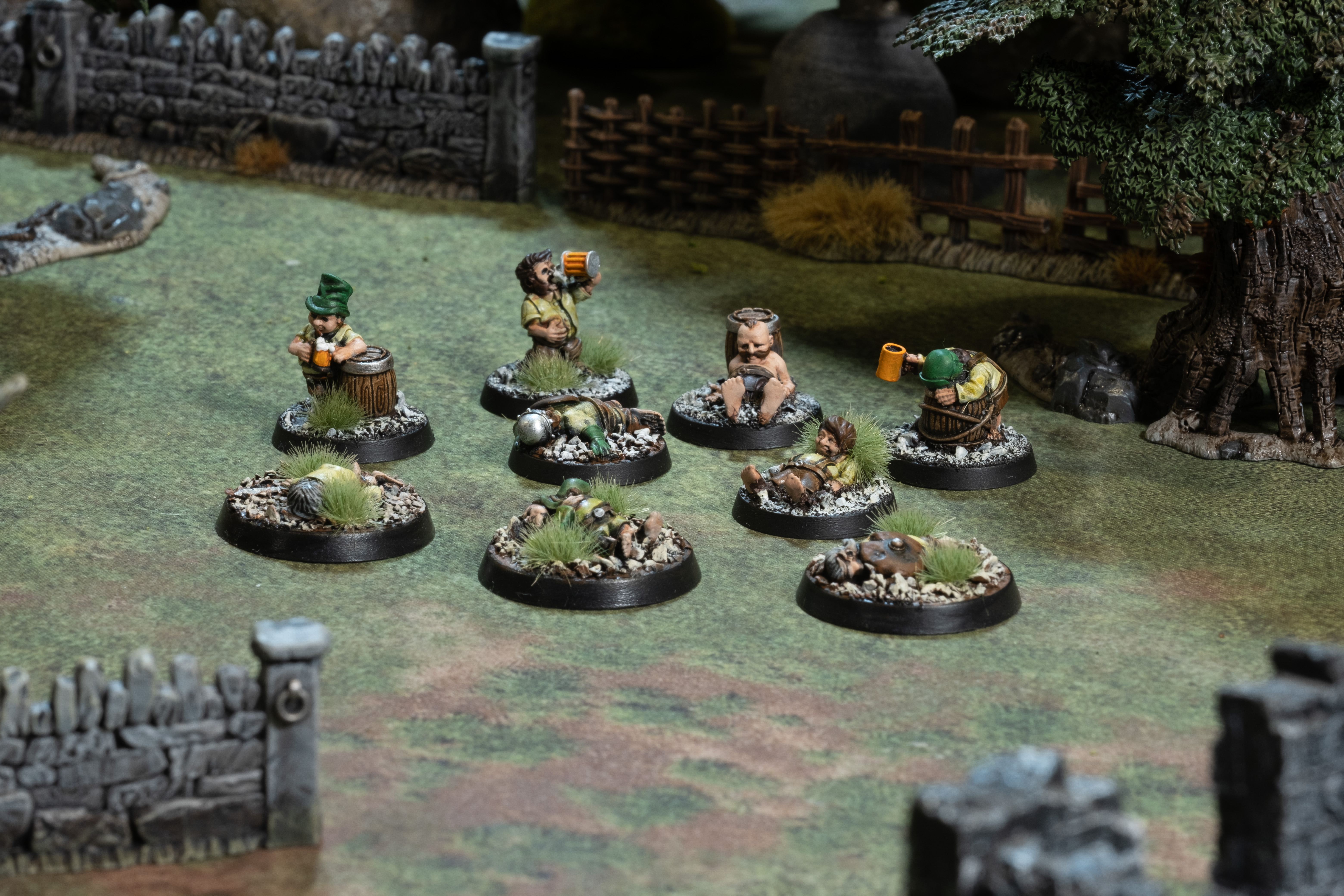 Gnomad revellers sleeping off a feast beside their barrels